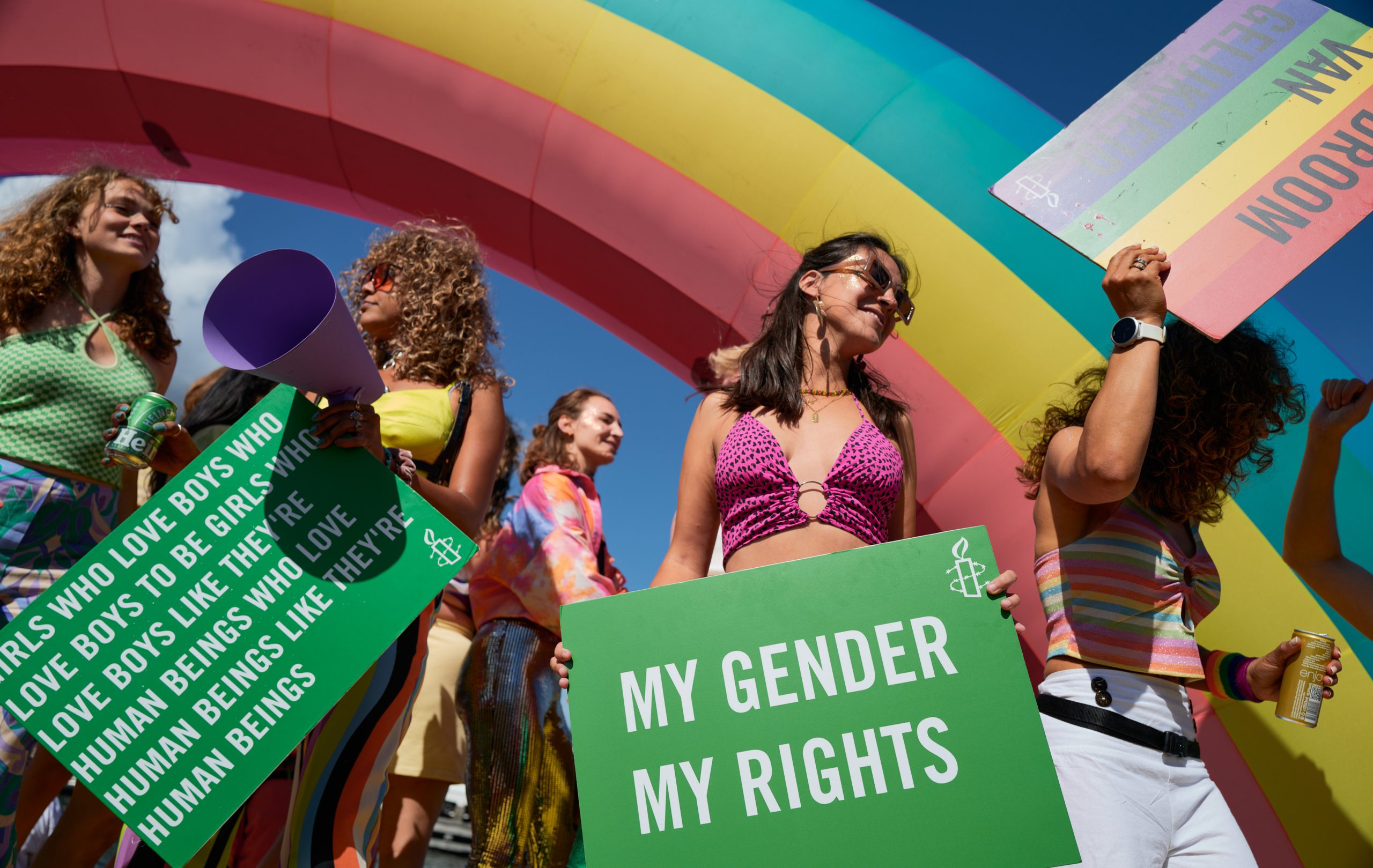 Local residents, people from the LGBTQIA+ community and human right activists affiliated to Amnesty International attend the Canal Parade on August 6, 2022 in Amsterdam, Netherlands.