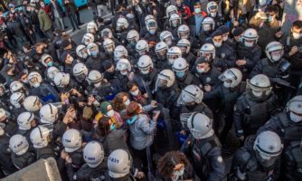 Turkish police officers detain protestors during a rally in support of Bogazici University students protesting against the appointment of Melih Bulu, a ruling Justice and Development Party (AKP) loyalist, as the new rector of the university, in Istanbul on February 4, 2021.