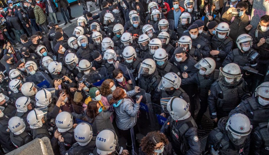 Turkish police officers detain protestors during a rally in support of Bogazici University students protesting against the appointment of Melih Bulu, a ruling Justice and Development Party (AKP) loyalist, as the new rector of the university, in Istanbul on February 4, 2021.