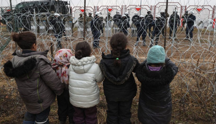 Migrants aiming to cross into Poland camp near the Bruzgi-Kuznica border crossing on the Belarusian-Polish border on November 17, 2021.