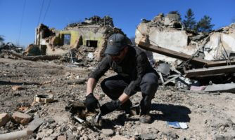 283591_Brian Castner carrying out weapons research in Ukraine.